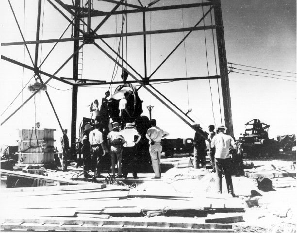 Lifting the 'gadget' into the 100-foot tower